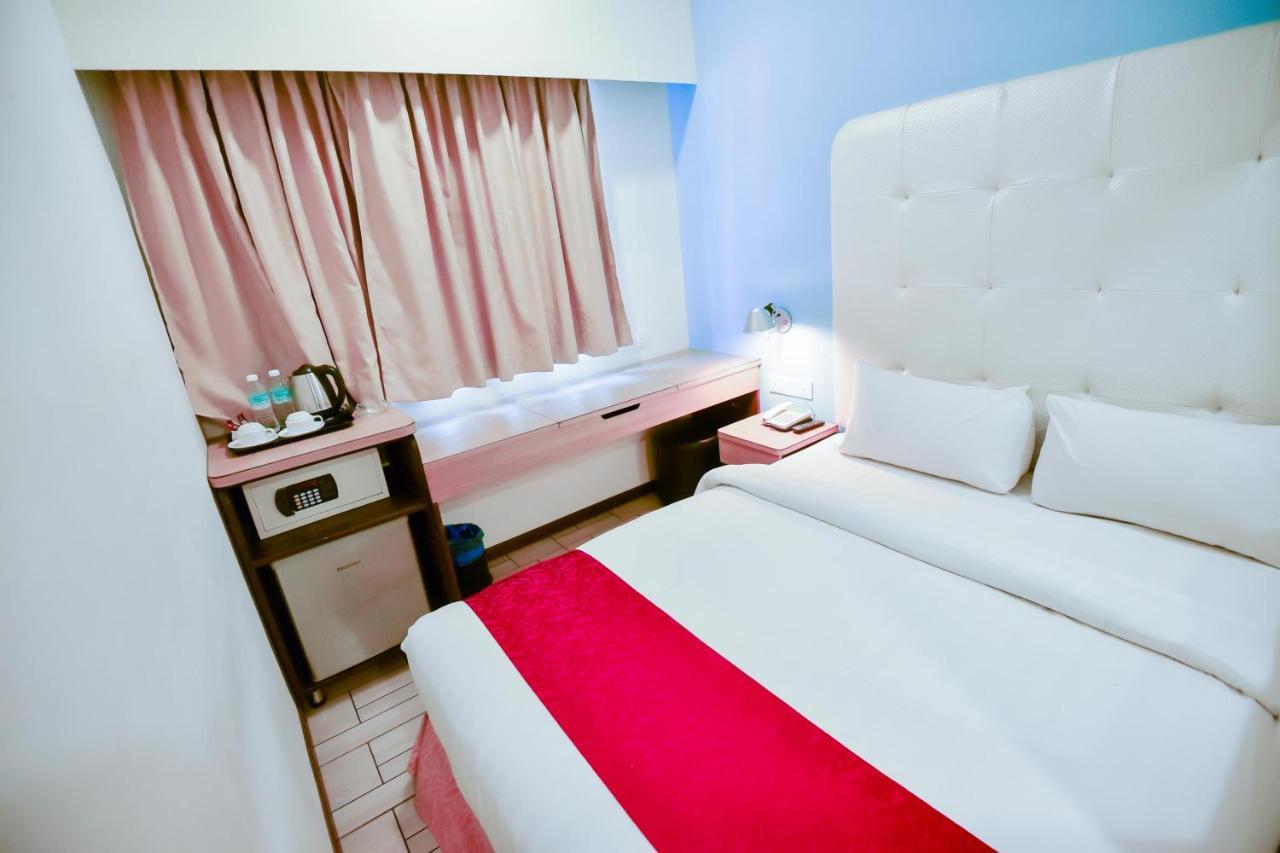Lumut Suites Bagian luar foto