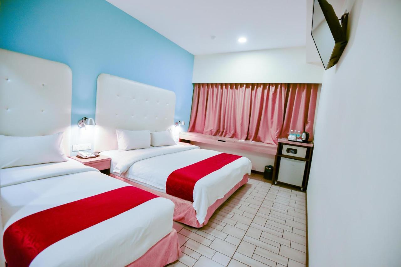 Lumut Suites Bagian luar foto